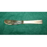 A Gerald Benny silver gilt butter knife with textured handle, 1.2g