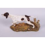 A Royal Doulton bone china figure of a pointer, 11 1/2" long