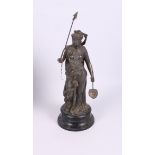 A spelter figure of a classical beauty, on circular base, 14" high