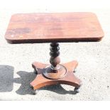 A William IV rosewood centre table, on turned column and quadriform base, 33 1/2" wide