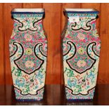 A pair of Longwy floral and scroll enamel decorated square section vases, 14" high