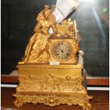 A French 19th Century gilt brass mantel clock with Catherine de Medici figure and eight-day cylinder