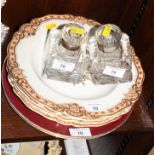 Four 19th Century gilt scroll decorated soup plates, a pair of floral decorated cabinet plates and