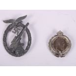 A WWII Nazi German Luftwaffe Flak Artillery badge and an 1888 Zwei Mark silver coin in brooch mount