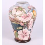 A Moorcroft limited edition relief decorated vase, 9 1/4" high