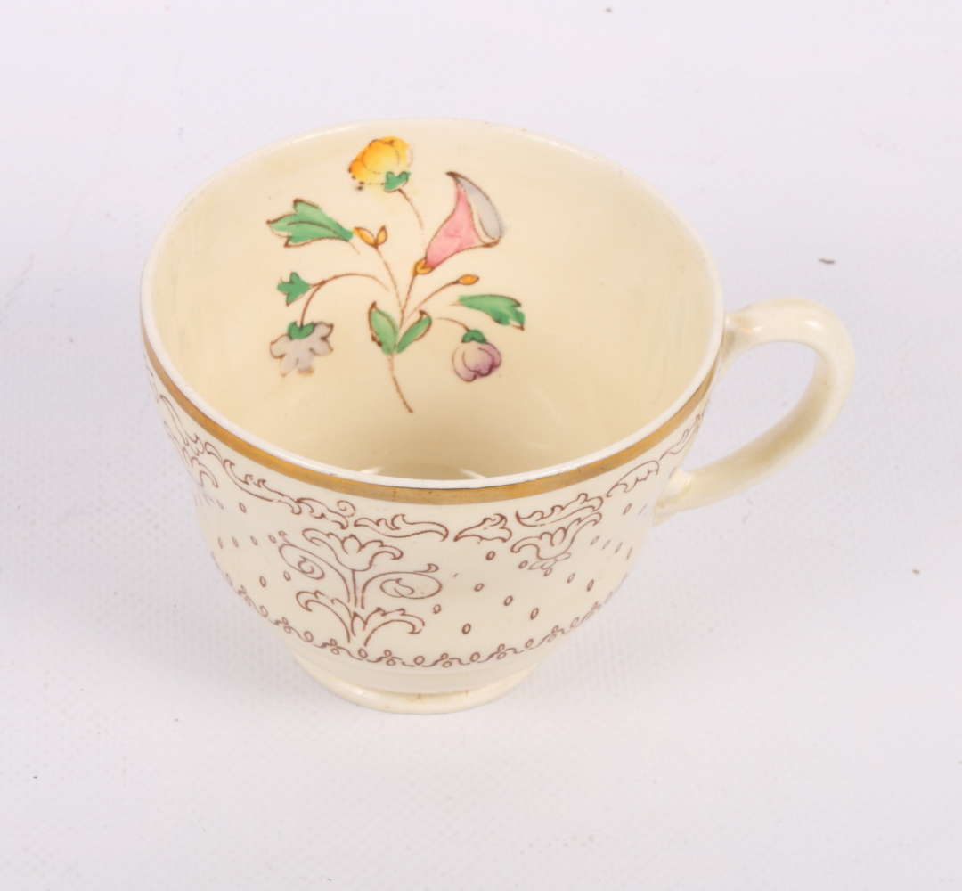 A Clarice Cliff for Wilkinson's floral decorated part teaset, seven continental ribbon plates,