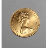 An Isle of Man gold sovereign dated 1973