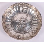 A Georgian silver dish, the central panel with putto riding a clam shell, 6oz troy approx (marks