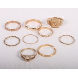 A number of 9ct gold rings, 14.6g, and a 22ct gold wedding band, 1.8g