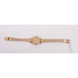 A lady's Mappin & Webb 9ct gold cased manual wind wristwatch with gilt dial and baton numerals, on