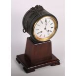 A late 19th Century French mantel clock in anodised cylinder case with eight-day striking movement