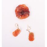 A Chinese agate carving of three peaches and a similar pair of earrings carved mice on grapevines