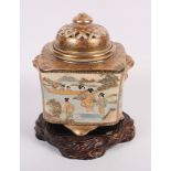 A Satsuma pot-pourri jar and cover with figure decoration, 6 1/2" high, on hardwood stand (pierced