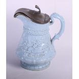 A Ridgways & Co "Tam o' Shanter" jug with pewter cover, 9" high