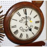 An early 20th Century Boots the Chemist fusee wall clock with painted dial, 16" high overall