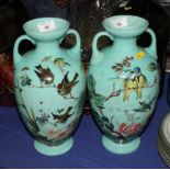 A pair of 19th Century continental bird enamel decorated two-handled vases, 12 1/2" high (one