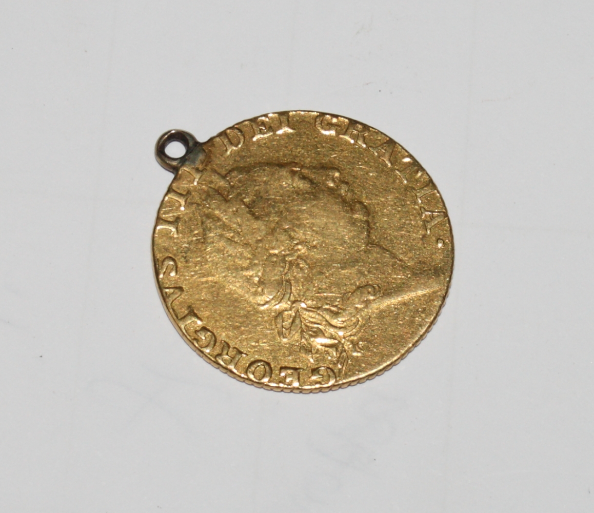 A George III gold guinea dated 1787 (hard mounted) - Image 2 of 2