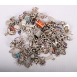 Five silver charm bracelets and a number of loose charms