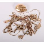 A 9ct gold charm bracelet together with a selection of other gold jewellery, 30.4g