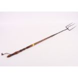 A late Georgian steel toasting fork with fruitwood handle, 29" long