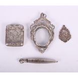 A silver fob, a continental oval picture frame, a vesta case and a propelling pencil