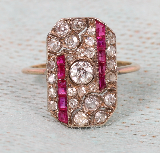 An Art Deco gold, diamond and ruby set plaque ring, size H