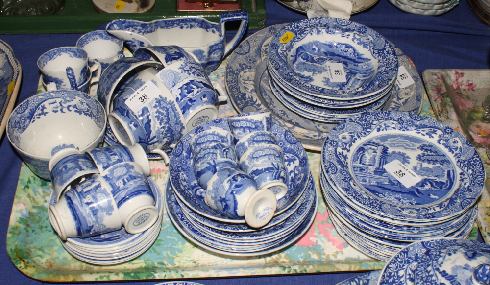 A collection of Spode Italian dinner plates, tea plates, cups, saucers, egg cups and a sauce boat