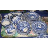 A collection of Spode Italian dinner plates, tea plates, cups, saucers, egg cups and a sauce boat