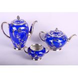 A Rosenthal Aida pattern part teaset comprising teapot, coffee pot and sucrier (lacking lid)