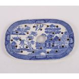 A 19th Century Willow pattern dish drainer, 13" wide, three smaller Willow pattern dish drainers,