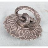 A Georgian cast silver serving dish handle formed as a coiled serpent, in the manner of Paul Storr,