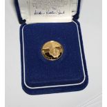 A Bermuda 100 dollar 900 grade fine gold coin dated 1975, in fitted case
