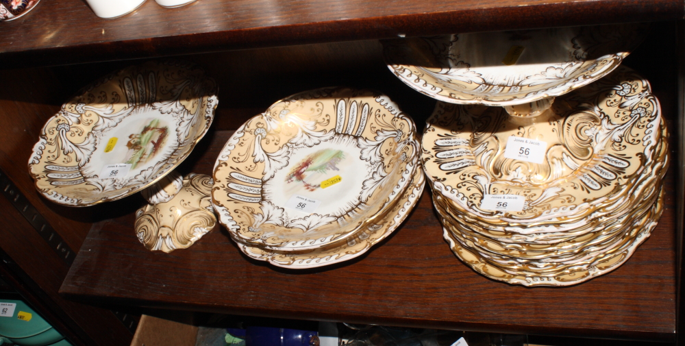 A Ridgways type mid 19th Century bone china landscape decorated part dessert service for twelve