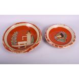 Two 19th Century continental terracotta slip decorated shallow dishes, largest 12" dia (drilled