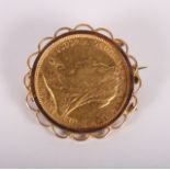 A gold sovereign dated 1893, in 9ct gold brooch mount
