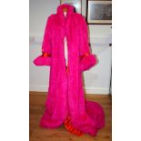 A "Queen of Hearts" theatrical costume and a large pink cloak