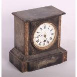 A Victorian mantel clock in black slate case with marble facings, back plate stamped "MAPLE & CO