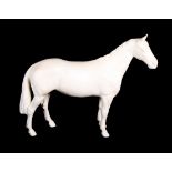 A Capodimonte figure of a horse by Zani, a Beswick figure of a shire horse, a Beswick bisque