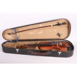 A 19th Century half-size violin, in wooden case with bow, violin 20" high