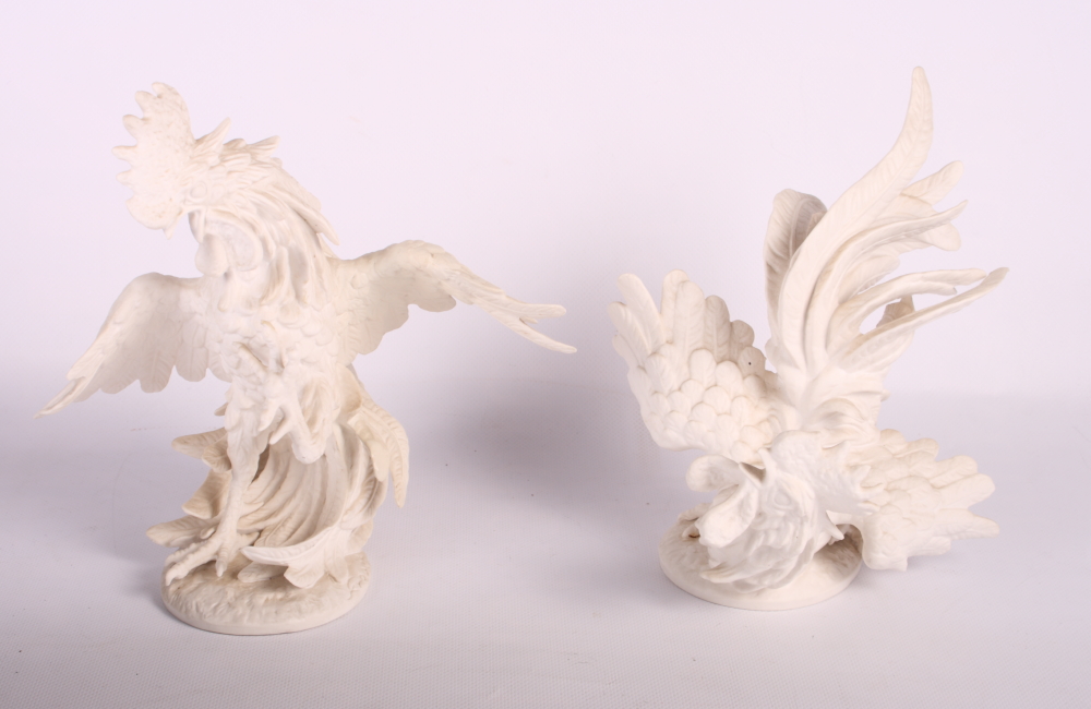 A pair of Goebels bisque porcelain fighting cocks