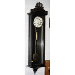 A Vienna type wall clock with ebonised case