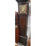 A Georgian oak provincial long case clock with thirty-hour movement and brass dial by George