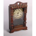 A walnut cased mantel clock and a wall clock