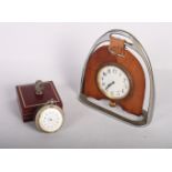 A silver plated pocket watch stand in the form of a stirrup, a pocket watch with silver case and a