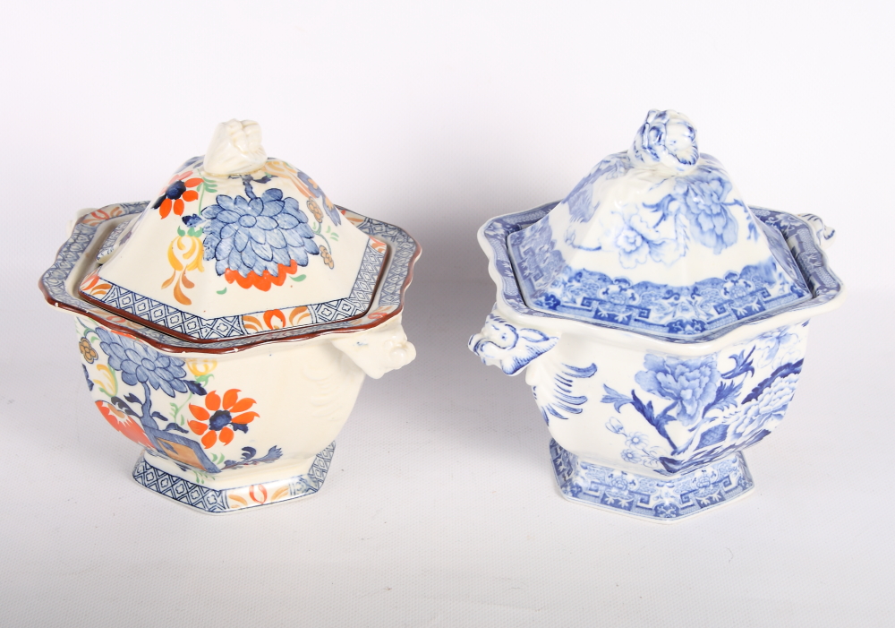 Two Mason's sauce tureens, a German porcelain figure of a seated lady and admirer, five Wedgwood