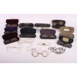 A collection of rolled gold and gold coloured spectacles, some in cases