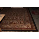 A Persian design carpet decorated Herati pattern and four border stripes, 144" x 108" approx