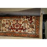 A Heriz design beige ground rug, 90" x 63" approx