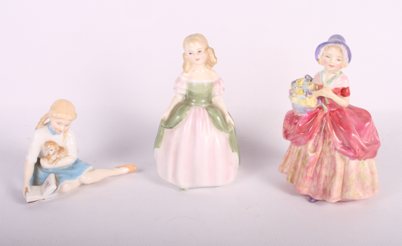 Two Royal Doulton china figures, "Penny" HN2338 and "Cissie", and a similar figure, "My Pet" HN2238