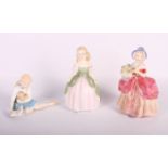 Two Royal Doulton china figures, "Penny" HN2338 and "Cissie", and a similar figure, "My Pet" HN2238